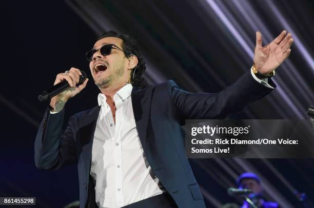 In this handout photo provided by One Voice: Somos Live!, Marc Anthony performs onstage at One Voice: Somos Live! A Concert For Disaster Relief at...