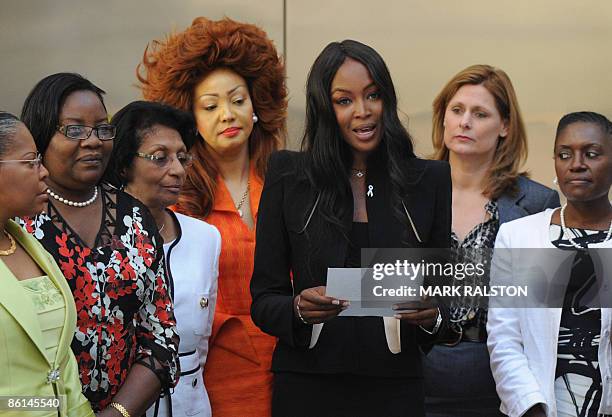 Sarah Brown , wife of the British Prime Minister Gordon Brown, stands beside supermodel Naomi Campbell along with First Lady Chantal Biya of Cameroon...