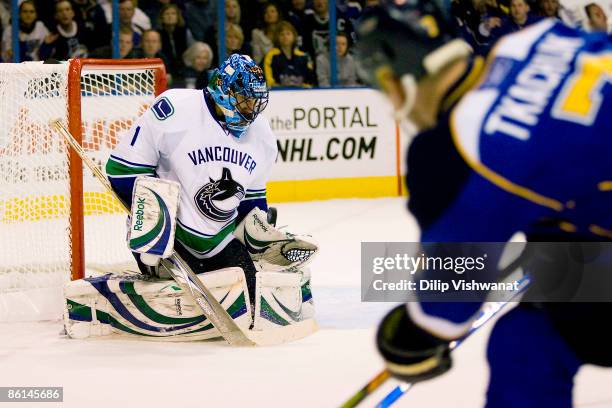 Roberto Luongo of the Vancouver Canucks makes a save against the St. Louis Blues during Game Four of the Western Conference Quarterfinals of the 2009...