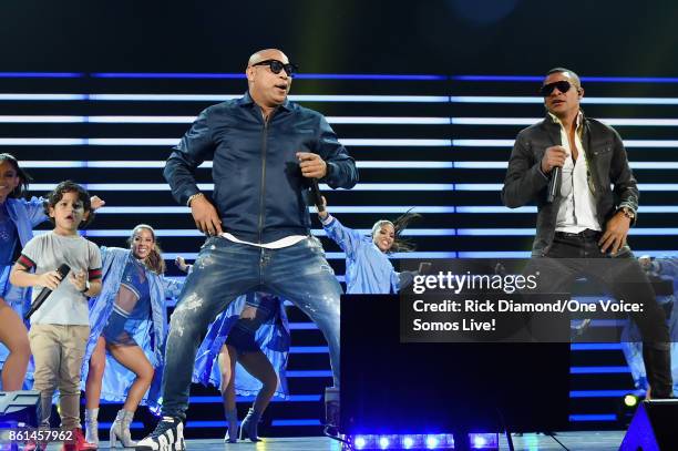 In this handout photo provided by One Voice: Somos Live!, Alexander Delgado and Randy Malcom Martinez of Gente de Zona perform onstage at One Voice:...