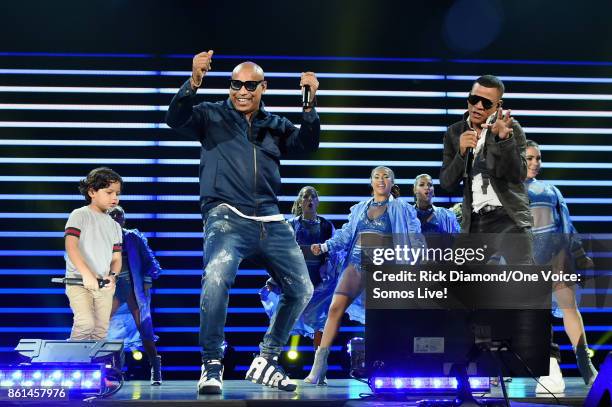 In this handout photo provided by One Voice: Somos Live!, Alexander Delgado and Randy Malcom Martinez of Gente de Zona perform onstage at One Voice:...