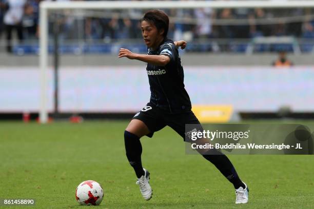 Jin Izumisawa of Gamba Osaka in action during the J.League J1 match between Gamba Osaka and Albirex Niigata at Suita City Football Stadium on October...