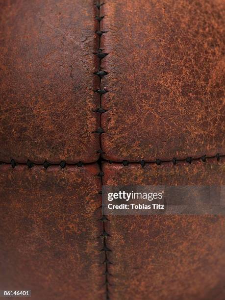 detail of an australian rules football - sutura fotografías e imágenes de stock