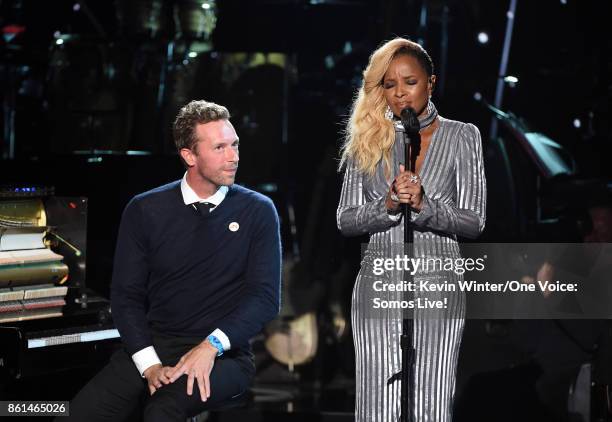 In this handout photo provided by One Voice: Somos Live!, recording artists Chris Martin and Mary J. Blige perform onstage during "One Voice: Somos...