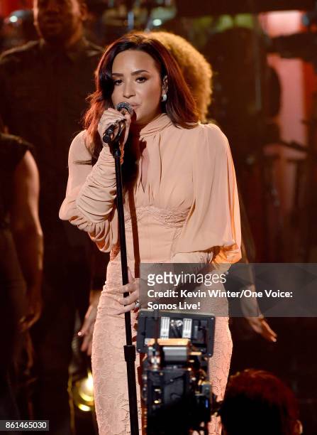 In this handout photo provided by One Voice: Somos Live!, singer Demi Lovato performs onstage during "One Voice: Somos Live! A Concert For Disaster...
