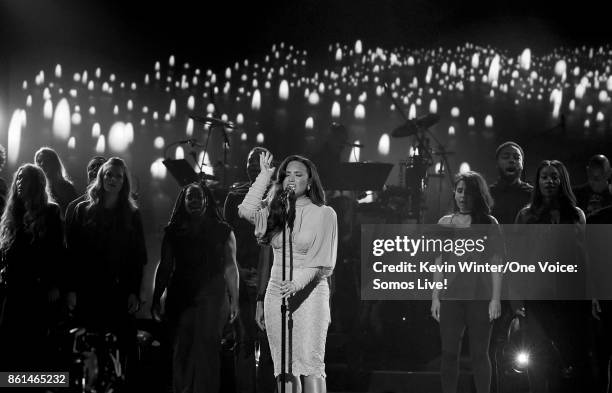 In this handout photo provided by One Voice: Somos Live!, singer Demi Lovato performs onstage during "One Voice: Somos Live! A Concert For Disaster...