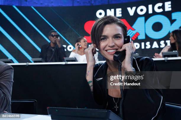 In this handout photo provided by One Voice: Somos Live!, Ruby Rose participates in the phone bank during "One Voice: Somos Live! A Concert For...