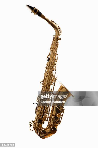 a saxophone, studio shot - saxofoon stockfoto's en -beelden