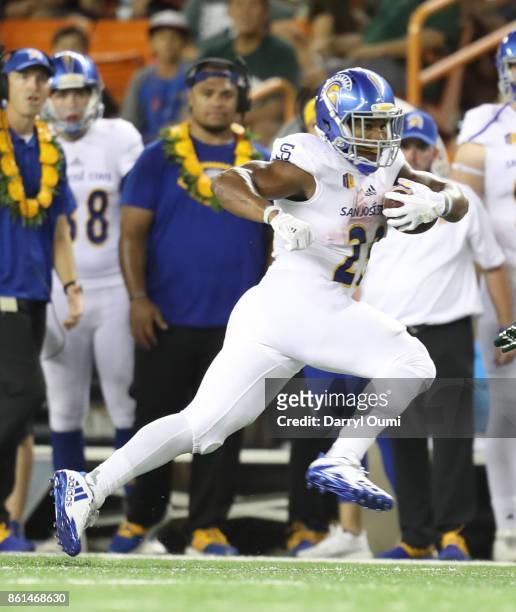 Tyler Nevens of the San Jose State Spartans runs the ball up the sideline during the first quarter of the game against the Hawaii Rainbow Warriors at...