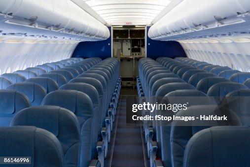 The empty cabin of an airplane The empty cabin of an airplane