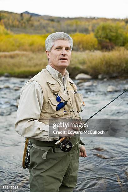 1,007 Fishing Vest Stock Photos, High-Res Pictures, and Images - Getty  Images