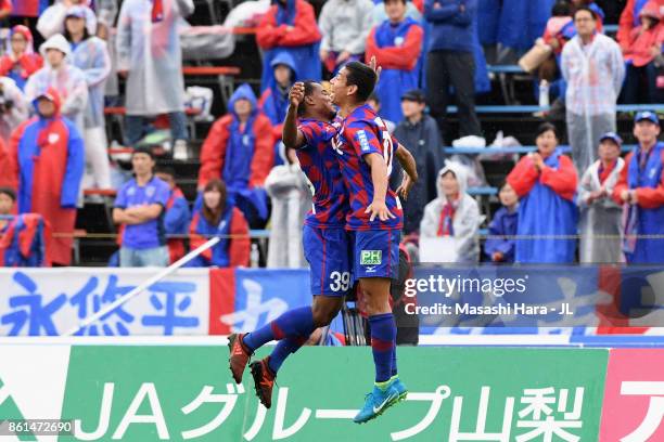 Lins of Ventforet Kofu celebrates scoring the opening goal with his team mate Dudu during the J.League J1 match between Ventforet Kofu and FC Tokyo...