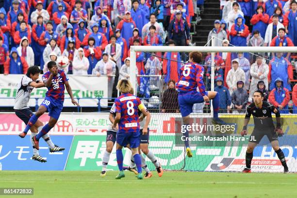 Lins of Ventforet Kofu heads the ball to score the opening goal during the J.League J1 match between Ventforet Kofu and FC Tokyo at Yamanashi Chuo...