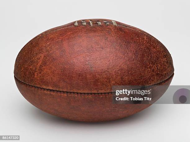 a leather australian rules football - rugby ball stock pictures, royalty-free photos & images