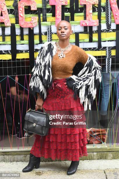 Patron pose for a photo at 2017 AfroPunk Festival Atlanta at Mechanicsville on October 14, 2017 in Atlanta, Georgia.