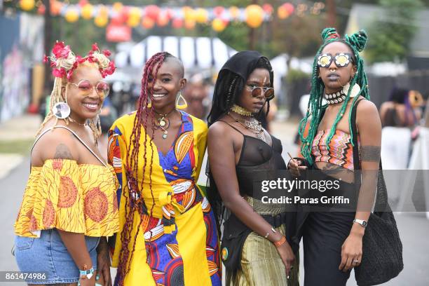 Patrons pose for a photo at AfroPunk Festival Atlanta at Mechanicsville on October 14, 2017 in Atlanta, Georgia.