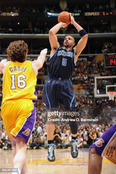 Carlos Boozer of the Utah Jazz shoots against Pau Gasol of the Los Angeles Lakers in Game Two of the Western Conference Quarterfinals during the 2009...