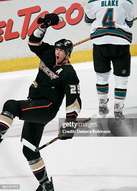 Rob Blake of the San Jose Sharks skates away as Chris Pronger of the Anaheim Ducks celebrates a second period goal during Game Three of the Western...