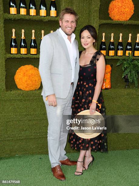 Chef Curtis Stone and actress Lindsay Price attend the 8th annual Veuve Clicquot Polo Classic at Will Rogers State Historic Park on October 14, 2017...