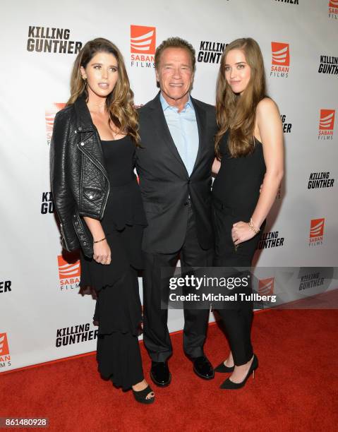 Katherine Schwarzenegger, actor Arnold Schwarzenegger and Christina Schwarzenegger attend the premiere of Saban Films' 'Killing Gunther' at TCL...