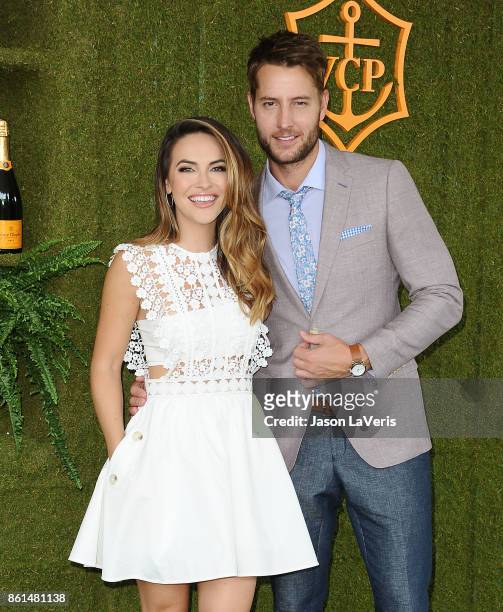 Actress Chrishell Stause and actor Justin Hartley attend the 8th annual Veuve Clicquot Polo Classic at Will Rogers State Historic Park on October 14,...
