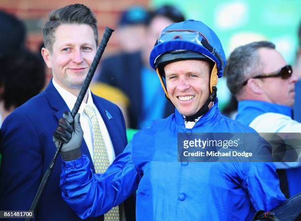 Jockey Kerrin McEvoy celebrates after riding Folkswood to win race 8 the TAB Cranbourne Cup during Cranbourne Cup Day at on October 15, 2017 in...