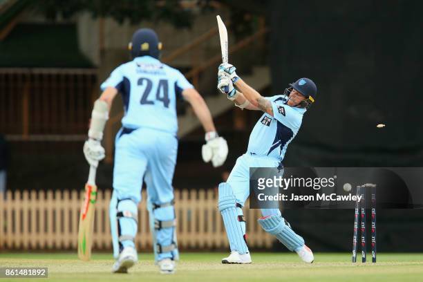 Doug Bollinger of NSW is bowled by Will Sutherland of Victoria during the JLT One Day Cup match between New South Wales and Victoria at North Sydney...