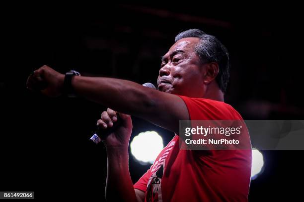 Former Malaysian Deputy Prime Minister, Tan Sri Dato' Haji Muhyiddin Yassin delivers a speech during the Anti-Kleptocracy rally at Padang Timur,...