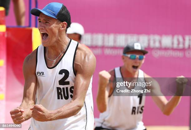 Maxim Sivolap and Igor Velichko of Russia celebrate winning the final match against Juan Virgen and Lombardo Ontiveros of Mexico on Day 5 of FIVB...