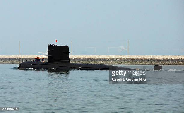 Chinese navy submarine leaves Qingdao Port on April 22, 2009 in Qingdao of Shandong Province, China. China's navy is set to hold a huge maritime...
