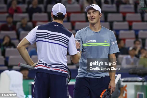 Henri Kontinen of Finland and John Peers of Australia celebrates after win over Marcelo Melo of Brazil and Lukasz Kubot of Poland duirng the Men's...