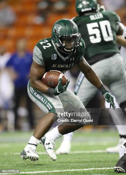 Diocemy Saint Juste of the Hawaii Rainbow Warriors waits for a hole to open during the fourth quarter of the game against the San Jose State Spartans...