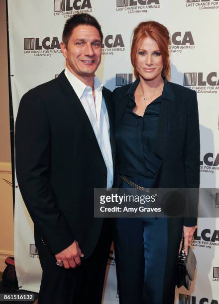 Carl Ferro and Angie Everhart attend the Last Chance For Animals 33rd Annual Celebrity Benefit Gala - Arrivals at The Beverly Hilton Hotel on October...
