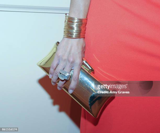 Katie Cleary, bag and jewelry detail, attends the Last Chance For Animals 33rd Annual Celebrity Benefit Gala - Arrivals at The Beverly Hilton Hotel...