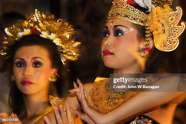 two female dancers - balinese headdress stock pictures, royalty-free photos & images