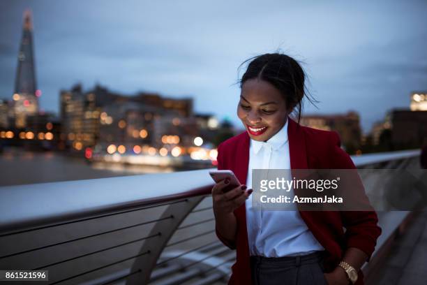 businesswoman using digital tablet - the media stock pictures, royalty-free photos & images