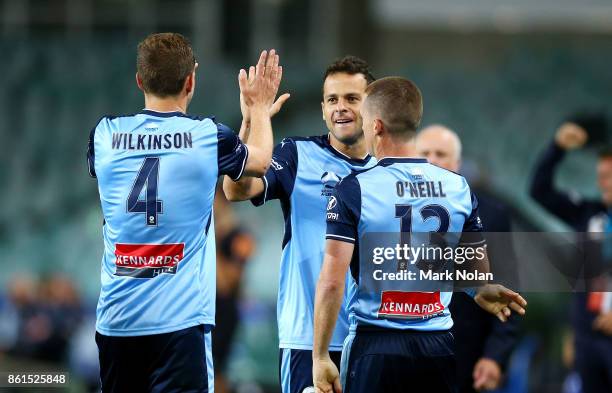 Bobo of Sydney celebrates scoring a goal with team mates during the round two A-League match between Sydney FC and the Wellington Phoenix at Allianz...