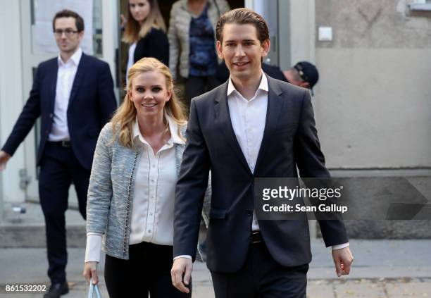 Austrian Foreign Minister and leader of the conservative Austrian Peoples Party Sebastian Kurz and his girlfriend Susanne Thier leave after casting...