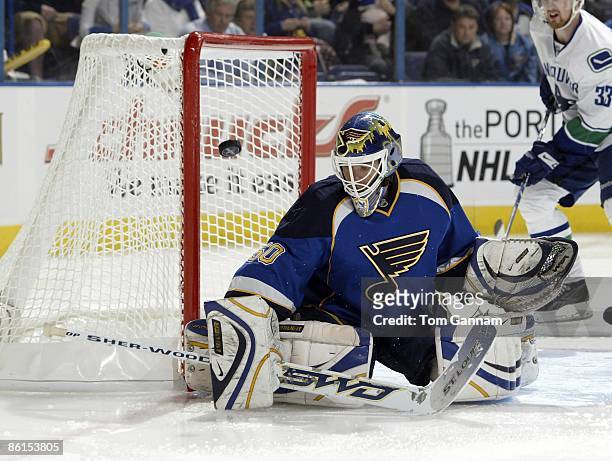 Chris Mason of the St. Louis Blues defends against the Vancouver Canucks during Game Four of the Western Conference Quarterfinal Round of the 2009...