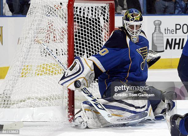 Chris Mason of the St. Louis Blues defends against the Vancouver Canucks during Game Four of the Western Conference Quarterfinal Round of the 2009...