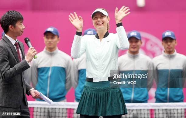 Maria Sharapova of Russia celebrates after winning the women's singles final match against Aryna Sabalenka of Belarus at the WTA Tianjin Open tennis...