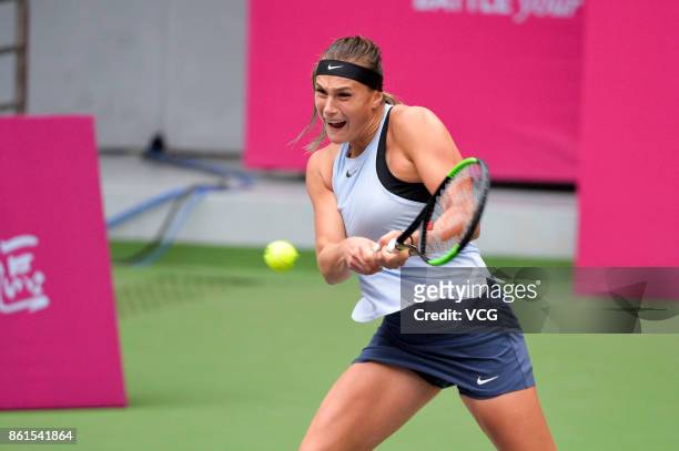 Aryna Sabalenka of Belarus competes against Maria Sharapova of Russia during their women's singles final match at the WTA Tianjin Open tennis...