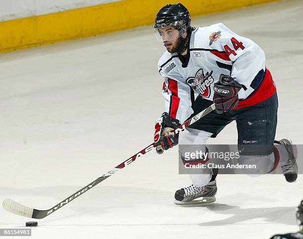 Justin Shugg of the Windsor Spitfires skates with the puck in Game Two of the Western Conference Championship against the London Knights on April 17,...