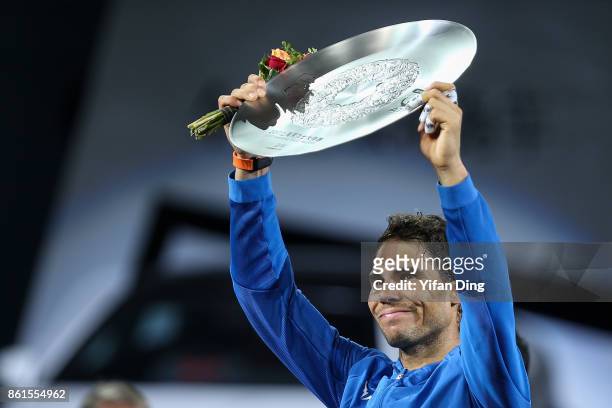Rafael Nadal of Spain poses with runner-up trophy during the award ceremony after losing his Men's singles final match against Roger Federer of...