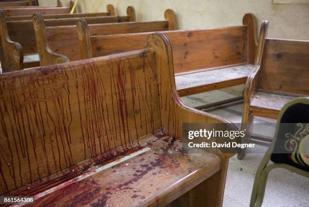April 09: Blood stains a pew inside the Mar Girgis church where a bomb exploded during Palm Sunday Services on April 09, 2017 in Tanta, Egypt. A...