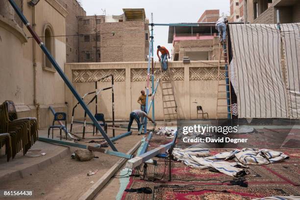 April 10: Mourners gather outside the Mar Girgis church for a funeral April 10, 2017 in Tanta, Egypt. The main funeral was held the night of the...