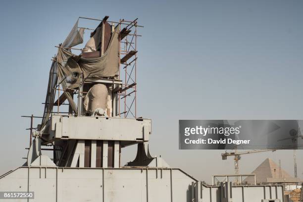 Cairo, Egypt The statue of Rameses II stands in front of the construction site of the Grand Egyptian Museum stands at the edge of Giza on May 08,...