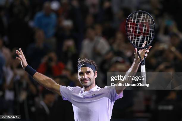 Roger Federer of Switzerland celebrates after winning the Men's singles final mach against Rafael Nadal of Spain on day eight of 2017 ATP Shanghai...