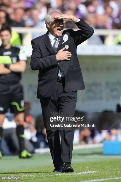 Luigi Del Neri head coach of Udinese Calcio shouts instructions to his players during the Serie A match between ACF Fiorentina and Udinese Calcio at...