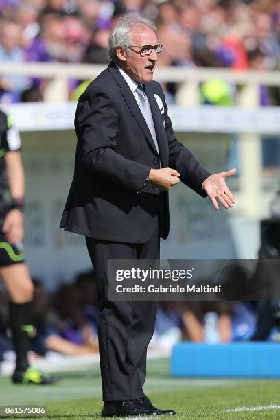 Luigi Del Neri head coach of Udinese Calcio shouts instructions to his players during the Serie A match between ACF Fiorentina and Udinese Calcio at...